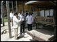 President George W. Bush and President Felipe Calderon of Mexico, right, are given a history of the Hacienda Temozon Tuesday, March 13, 2007, during a visit by the President and Mrs. Laura Bush. White House photo by Eric Draper