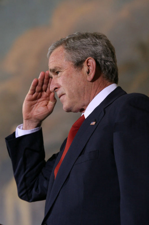 President George W. Bush salutes members of the Tuskegee Airmen during ceremonies at the U.S. Capitol Thursday, March 29, 2007, honoring America’s first African-American military airmen with the Congressional Gold Medal. The President told the men, “I would like to offer a gesture to help atone for all the unreturned salutes and unforgivable indignities. And so, on behalf of the office I hold, and a country that honors you, I salute you for the service to the United States of America.” White House photo by Eric Draper