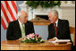 Vice President Dick Cheney listens to Lithuanian President Valdus Adamkus during a bilateral meeting held at the Presidential Palace in Vilnius, Lithuania, Wednesday, May 3, 2006. During the meeting the two leaders discussed their mutual determination to further the rise of democracy in the region. White House photo by David Bohrer