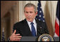 President George W. Bush speaks to the audience Thursday night, May 25, 2006, in the East Room during a joint press availability with Prime Minister Tony Blair of Great Britain. Said the President about Iraq's new government, "As we celebrate this historic moment, it's important to recall how we got there, and take stock in how far we've come." White House photo by Shealah Craighead