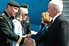 Defense Secretary Robert M. Gates and his wife Becky meet Canadian officials upon their arrival in Calgary, Canada, Sept. 2, 2008.  Gates is in Canada to attend the 8th Conference of Defense Ministers of the Americas in Banff.  