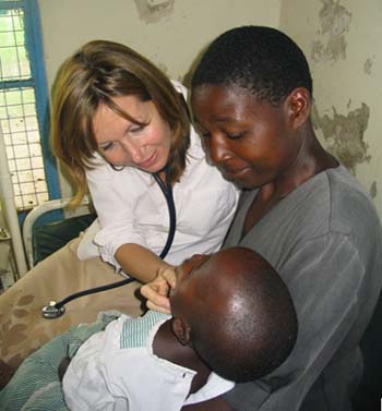 Dr. Mary Hamel with a young patient who participated in IPTi study.