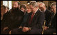 President George W. Bush is joined in prayer by Shirley Dobson, chairman of the National Day of Prayer Task Force, and Rabbi Sholom Ciment, the spiritual leader of Chabad-Lubavitch of Greater Boynton in Palm Beach County, Fla., during a celebration of National Prayer Day at the White House Thursday, May 4, 2006. White House photo by Eric Draper