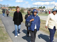 Seniors in Rembert, South Carolina, walk on a new track made possible by a mini-grant from the University of South Carolina Prevention Research Center