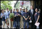 President George W. Bush stands with employees during a visit to Frager's Hardware store in the Capitol Hill neighborhood of Washington, D.C., Friday, May 5, 2006. White House photo by Eric Draper