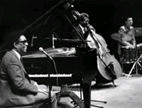 Mr. Taylor onstage with his trio: Curtis Boyd on bass and Keith Copeland, drums