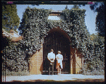 A couple standing at the door of Washington's tomb