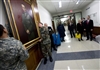 Retired U.S. Marine Gen. Peter Pace, 16th chairman of the Joint Chiefs, and his wife Lynne watch as his portrait is hung in the chairmans corridor at the Pentagon, Jan. 13, 2009.