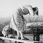 Oklahoma migratory workers washing in a desert hot spring