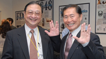 HRSA's Valentine S. Liu shares a "Live Long and Prosper" moment with George Takei.