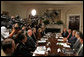 President George W. Bush makes a statement to the press during a meeting with his economic team Friday, July 27, 2007, in the Roosevelt Room. "Job growth has been strong, and that's what you'd expect when our economy is strong and resilient and flexible. People working, unemployment rate is down, wages are increasing," said President Bush. White House photo by Joyce N. Boghosian