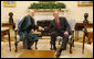 President George W. Bush meets with President Hamid Karzai of Afghanistan in the Oval Office Friday, Sept. 26, 2008, at the White House. White House photo by Eric Draper