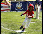 Maxwell Cowan of Eastern U.S. All-Stars rounds third base Wednesday, July 16, 2008, against the Central U.S. during an All-Star Tee Ball doubleheader on the South Lawn of the White House. White House photo by Eric Draper