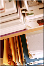 Image Books and Folders on a Bookshelf