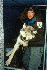 woman holding wolf