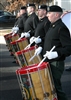 Percussionists with the Army’s 3rd U.S. Infantry Regiment's Old Guard Fife and Drum Corps march down Sheridan Avenue, Jan. 9, 2009, on Fort Myer, Va., in preparation for President-elect Barack Obama’s inaugural parade Jan. 20 in Washington, D.C.