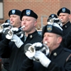 Buglers with the 3rd U.S. Infantry Regiment's Old Guard Fife and Drum Corps march down Sheridan Avenue, Jan. 9, 2009, on Fort Myer, Va., in preparation for President-elect Barack Obama’s inaugural parade Jan. 20 in Washington, D.C.