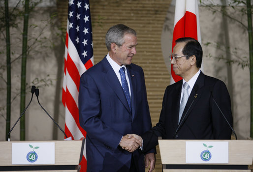 President George W. Bush and Prime Minister Yasuo Fukuda of Japan shake hands after their joint press availability Sunday, July 6, 2008, in Toyako on the northern Japanese Island of Hokkaido. White House photo by Eric Draper