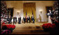 President George W. Bush introduces 2008 Kennedy Center Honoree George Jones, second from left, Sunday, Dec. 7, 2008, during the Kennedy Center Gala Reception in the East Room at the White House. Jones is applauded by fellow honorees, from left, Morgan Freeman, Barbra Streisand, Twyla Tharp, Roger Daltrey and Pete Townshend  White House photo by Eric Draper