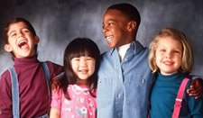 Photo of 4 smiling children