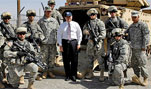 Defense Secretary Robert M. Gates takes a photo with troops at the future combat systems facility on Fort Bliss in El Paso, Texas, May 1, 2008.