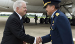 Upon his arrival in Bangkok, Thailand, U.S. Defense Secretary Robert M. Gates, left, shakes hands with Air Chief Marshal Chalit Pookpasuk of the Royal Thai Air Force, June 1, 2008.