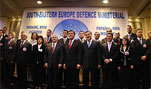 Defense Secretary Robert M. Gates joins other representatives attending the 12th annual meeting of the Southeast Europe Defense Ministerial in Kyiv, Ukraine, for a group photo on Oct. 22, 2007.