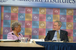 Grace Butler, Ph.D., and President George W. Bush at NCI.