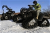 Staff Sgt. John Cooke tests the maneuverability of an all terrain vehicle.