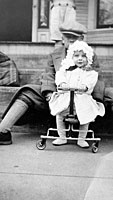 Gerald Ford and his half-brother Dick on the steps in front of their home at 649 Union Street