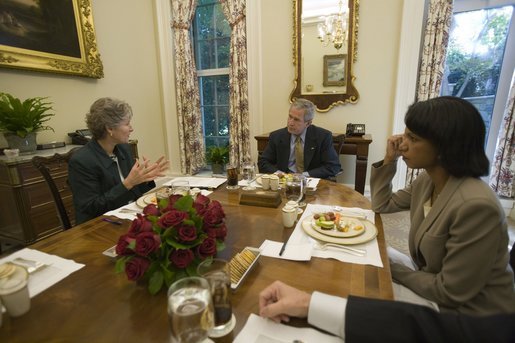 President George W. Bush is joined for lunch Wednesday, Oct. 5, 2005, by Secretary of State Dr. Condoleezza Rice and Karen Hughes, newly appointed Under Secretary of State for Public Diplomacy and Public Affairs. White House photo by Eric Draper