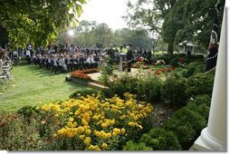 President George W. Bush and President Mahmoud Abbas, of the Palestinian Authority, stand before the media Thursday, Oct. 20, 2005, during a joint availability in the Rose Garden of the White House.  White House photo by Paul Morse