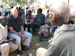 Photo of Rear Adm. Ziemer listening to village elders during a visit to Kapululwe.