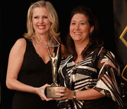 Fox Business Network’s Cheryl Casone presents GPO’s Chief of Staff Maria Lefevre with The Executive of the Year trophy