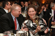 Image of Maria Lefevre, with her husband Doug, after winning the Executive of the Year award