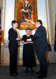 Nancy Erickson, Secretary of the U.S. Senate, administered the oath of office. Tapella's mother, Bernadette Tapella, is holding the Bible.