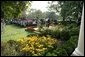 President George W. Bush and President Mahmoud Abbas, of the Palestinian Authority, stand before the media Thursday, Oct. 20, 2005, during a joint availability in the Rose Garden of the White House. White House photo by Paul Morse