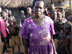 Photo of Helen Onen, a community-based distributor of medicines in Uganda, helped to distribute long-lasting insecticide-treated nets. (click here to see more)