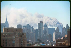 view of the Manhattan skyline showing the smoke from the World Trade Center towers
