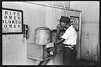 Drinking at 'colored' water cooler