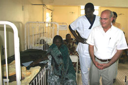 U.S. Malaria Coordinator Admiral R. Timothy Ziemer, right, tours the Regional Hospital in Thiès during a familiarization visit to Senegal.