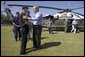 President George W. Bush is greeted by Jefferson Parish president Aaron Broussard upon his arrival Tuesday, Oct. 11, 2005 to New Orleans aboard Marine One. White House photo by Eric Draper