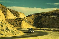 Road cut into the barren hills which lead into Emmett