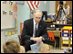 Deputy Secretary Ray Simon reads to kindergarten students at W.W. Ashurst Elementary School, located on Marine Corps Base Quantico.
