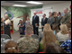 Jan Weiss, Principal of W.W. Ashurst Elementary School, introduces Deputy Secretary Ray Simon, Lt. General Pete Osman, USMC (ret.), President and CEO of the Marine Toys for Tots Foundation, Dr. Elaine Beraza, Director of the U.S. Department of Defense Domestic Dependent Elementary and Secondary Schools, DDESS District Superintendent Michael Gould and Colonel Charles Dallachie, Base Commander, Marine Corps base Quantico at an assembly to announce the 2008 Holiday Book Donation.