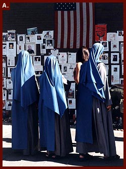 Nuns looking at missing notices following Sept. 11 terrorist attack, 2001, New York City,? 2001
