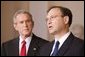 With President George W. Bush looking on, Judge Samuel A. Alito acknowledges his nomination Monday, Oct. 31, 2005, as Associate Justice of the U.S. Supreme Court. White House photo by Paul Morse