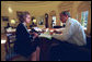 President George W. Bush and Harriet Miers are shown in the Oval Office in this Jan. 22, 2001 file photo. White House photo by Eric Draper