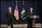 President George W. Bush appears on stage, Thursday, Oct. 6, 2005 at the Eisenhower Executive Office Building in Washington, with William F. Buckley, Jr., to honor the 50th anniversary of National Review magazine, which was founded by Buckley, and to recognize Buckley's upcoming 80th birthday. White House photo by Paul Morse