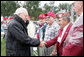 Vice President Dick Cheney shakes hands with veterans of the 526th Armored Infantry Battalion Friday, Oct. 7, 2005, after delivering remarks during a wreath-laying ceremony at the National World War II Memorial in Washington D.C. "I count it a privilege to stand in the presence of men who were sent into battle by President Franklin D. Roosevelt.and who, by your courage and honor and devotion to duty, helped to win a war and change the course of history ," said the Vice President to the soldiers, widows and family members who attended the ceremony. The 526th AIB is the sole remaining, separate, armored infantry battalion from World War II whose soldiers defended the Belgian villages of Stavelot and Malmedy on December 16, 1944, the first day of the Battle of the Bulge. White House photo by David Bohrer